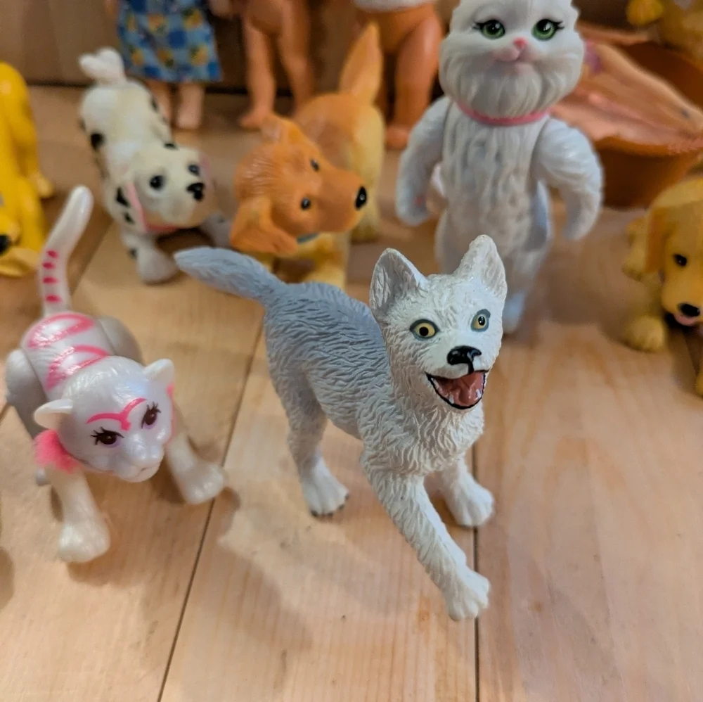 Assorted Small Pet Figurines  14 Pieces Pre-owned